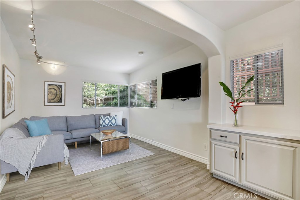 Informal living room open to remodeled kitchen with ocean view. There is an ocean view from this room! - 31122 Brooks Street, Laguna Beach CA 92651 - photo 14
