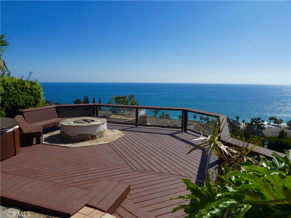 Abundant deck space for outdoor entertaining. The perfect home to enjoy year round sunset views. - 31122 Brooks Street, Laguna Beach CA 92651 - photo 17