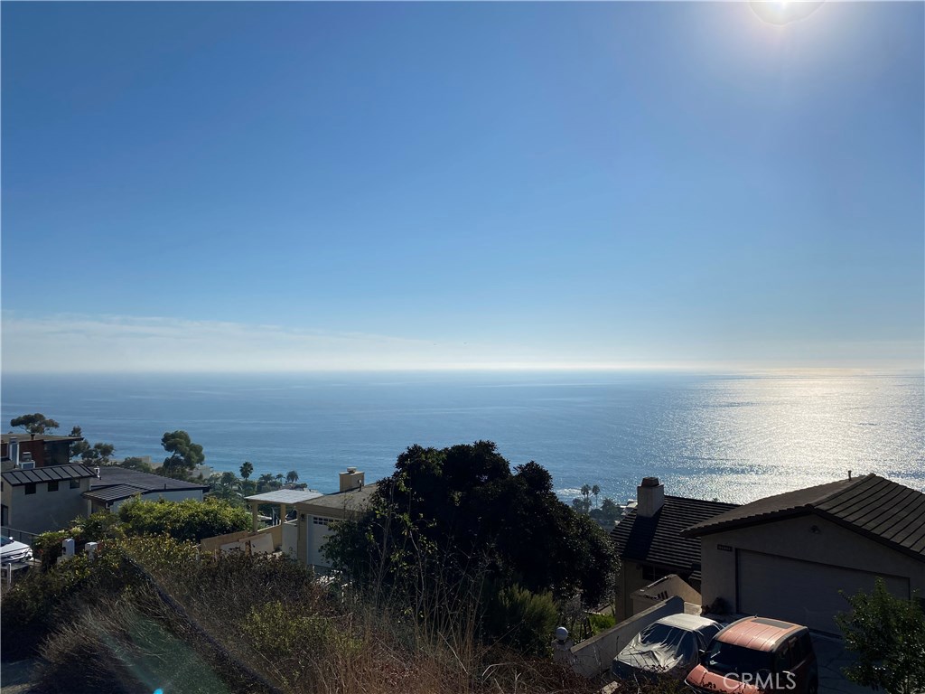 View from private road to lot (the view from the lot is panoramic ) Professional pictures coming soon. - 31204 Ceanothus, Laguna Beach CA 92651 - photo 1