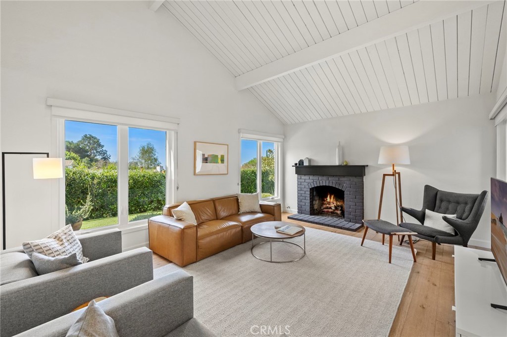 Living room with greenery, peek ocean view - 3121 Bern Drive, Laguna Beach CA 92651 - photo 6