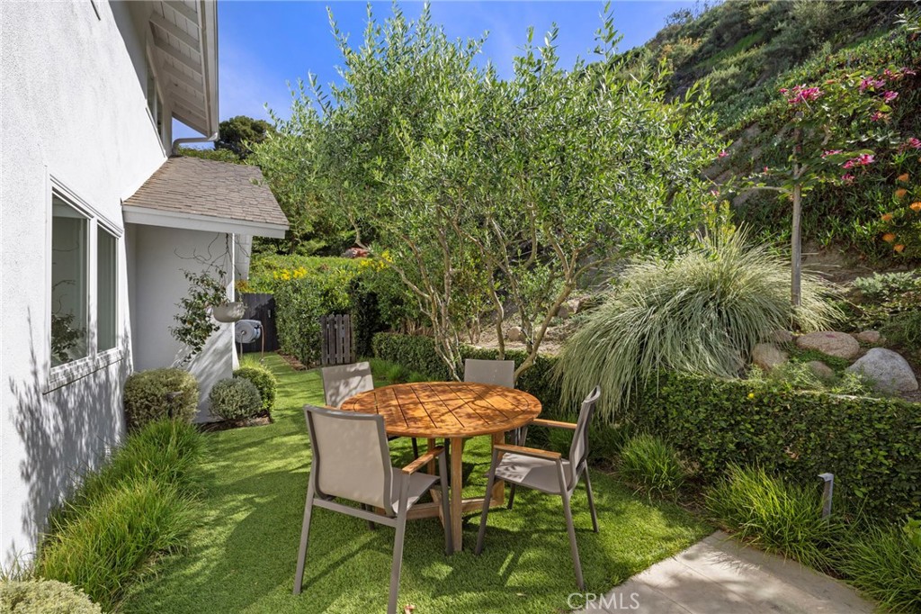 Seating area in backyard - 3121 Bern Drive, Laguna Beach CA 92651 - photo 36