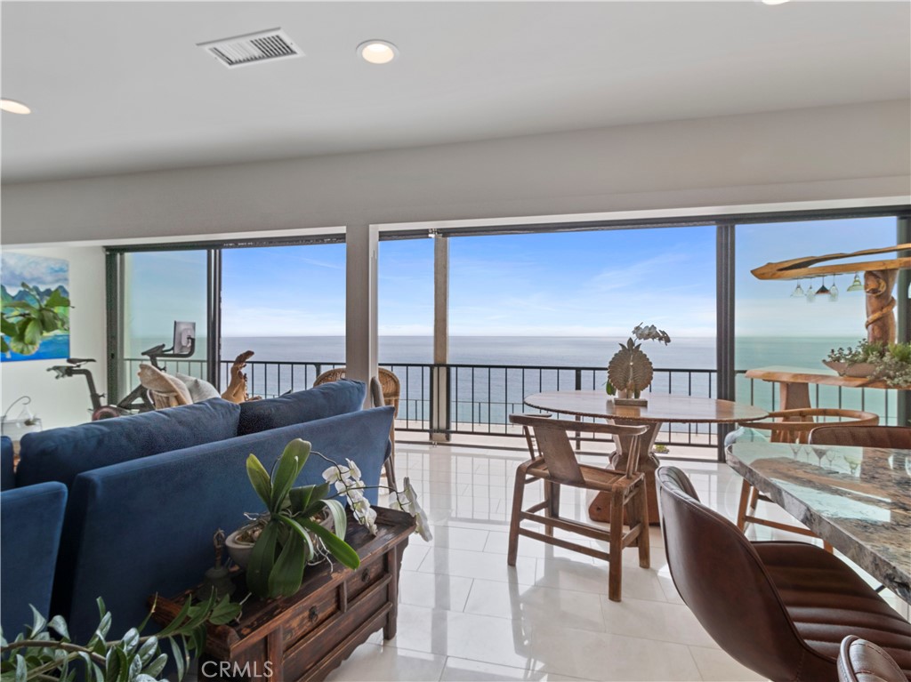 Fold back your glass wall of doors for unmatched panoramic ocean views from this fully renovated, top floor residence at - 31423 Coast 84, Laguna Beach CA 92651 - photo 1