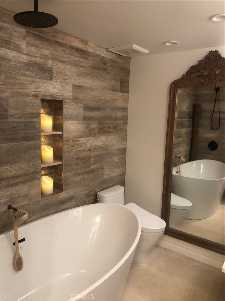 SECONDARY BATH WITH SPA TUB - 31423 Coast Highway S 12, Laguna Beach CA 92651 - photo 18
