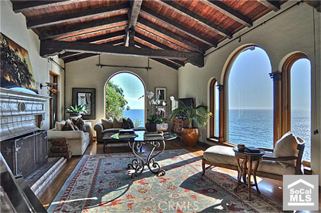Spacious Living areas with soaring Arched windows frame spellbinding views of the entire Laguna Coast. - 31515 BLUFF Drive, Laguna Beach CA 92651 - photo 1