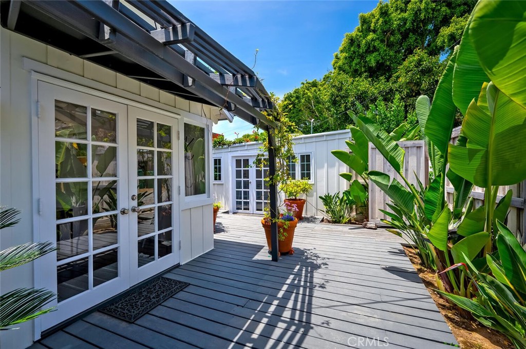 The deck separates the main cottage and the studio. - 31521 Summit Road, Laguna Beach CA 92651 - photo 2