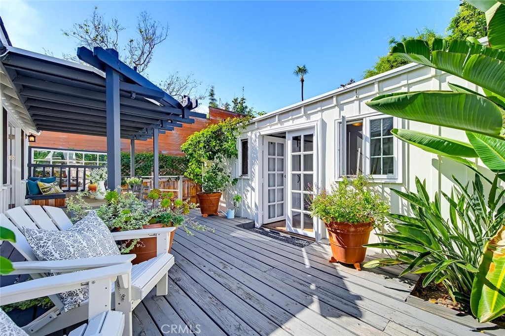 The deck separates the main cottage and the guest cottage. - 31521 Summit Road, Laguna Beach CA 92651 - photo 3