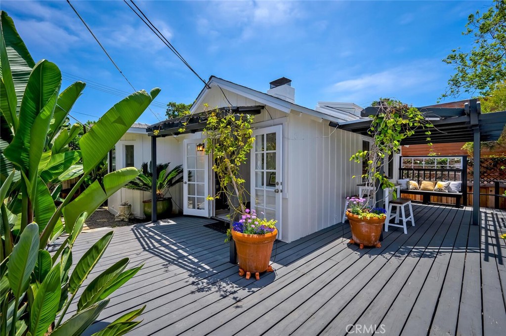 Spacious deck wraps around the property for indoor/ outdoor living. - 31521 Summit Road, Laguna Beach CA 92651 - photo 3