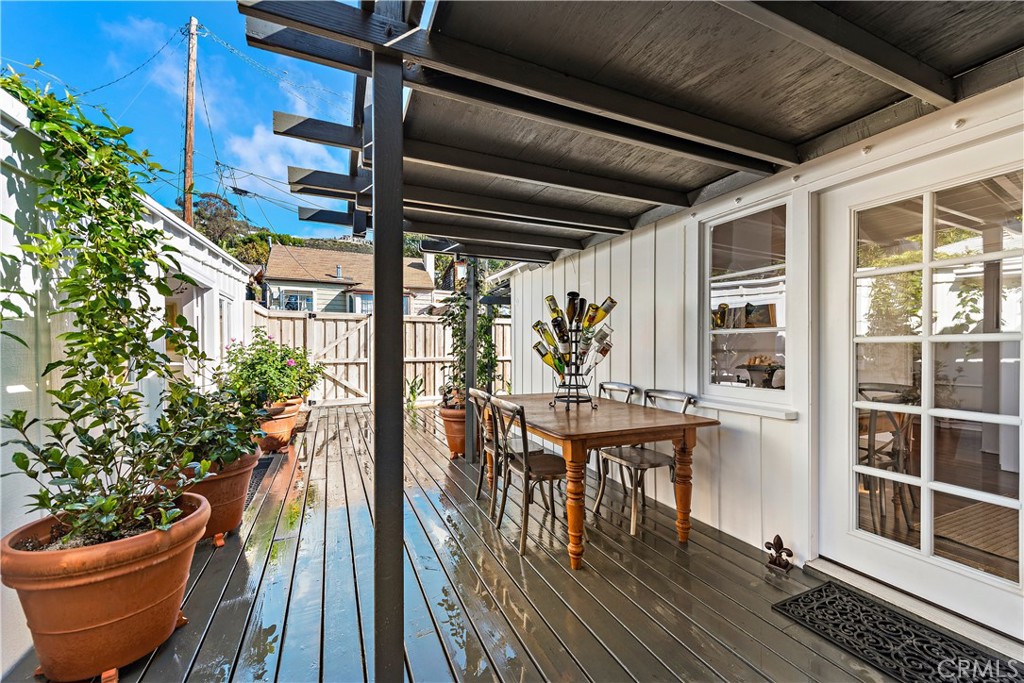 Covered deck in between the main cottage and studio. Wonderful for al fresco dining and entertaining. - 31521 Summit Road, Laguna Beach CA 92651 - photo 16
