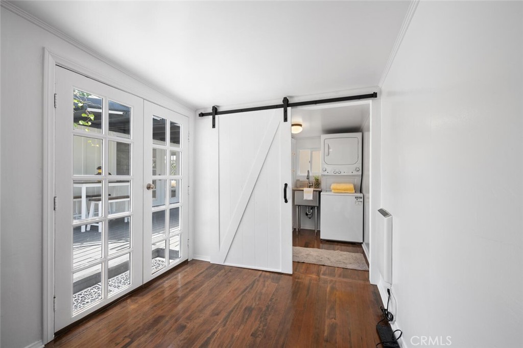Barn door closes off the bathroom in the studio. - 31521 Summit Road, Laguna Beach CA 92651 - photo 18