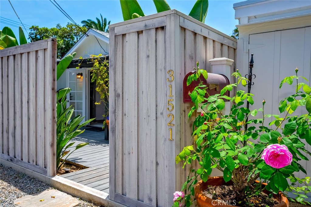 The property is fully enclosed with a newer gate. - 31521 Summit Road, Laguna Beach CA 92651 - photo 21