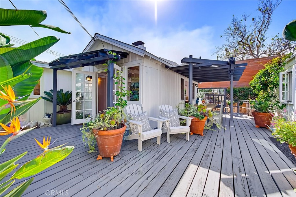 Spacious deck wraps around the property for indoor/ outdoor living. - 31521 Summit Road, Laguna Beach CA 92651 - photo 2