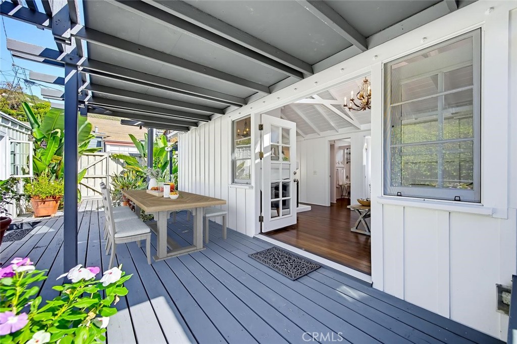 Imagine entertaining with family and friends in the intimate living room and out on the spacious deck. - 31521 Summit Road, Laguna Beach CA 92651 - photo 26
