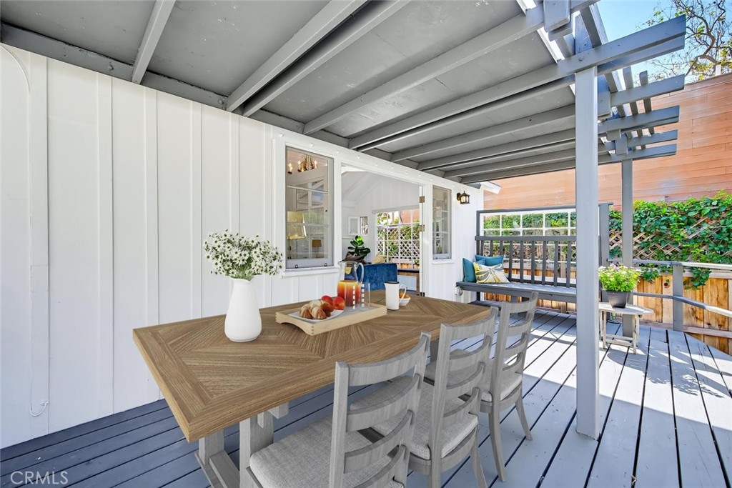 The covered deck provides for comfortable indoor/ outdoor living, ideal for entertaining! - 31521 Summit Road, Laguna Beach CA 92651 - photo 25