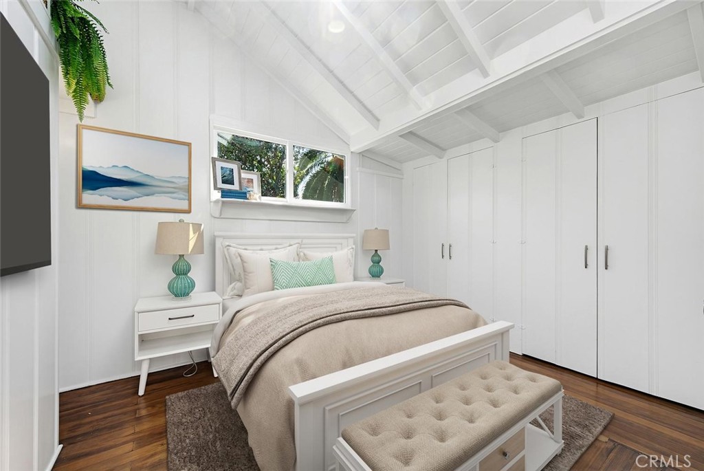 Bedroom in the main cottage with wood floors, high pitched beamed ceilings, and ample closet space. - 31521 Summit Road, Laguna Beach CA 92651 - photo 18