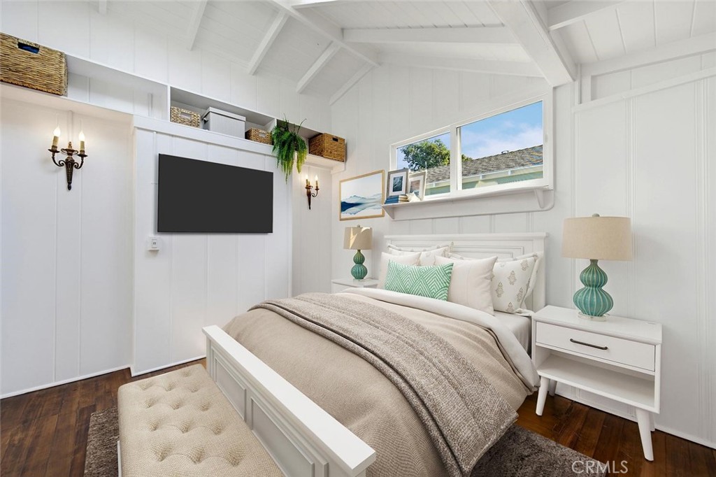 Bedroom in the main cottage with wood floors and high wood beamed ceilings.. Sweet built in accents and vintage light fi - 31521 Summit Road, Laguna Beach CA 92651 - photo 19