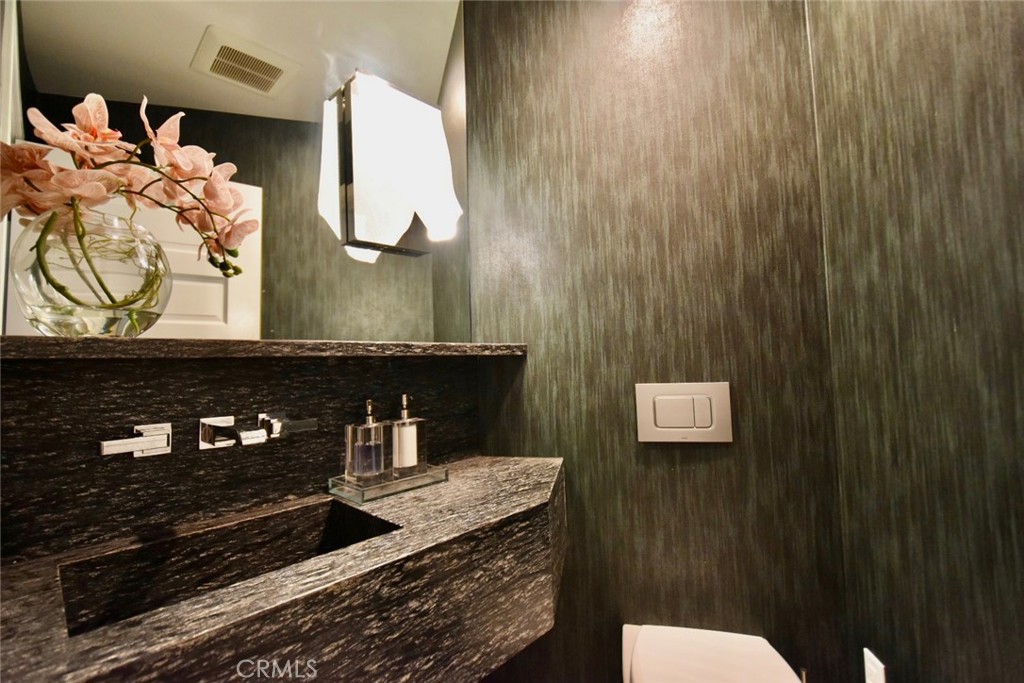 Powder bathroom - 31561 Table Rock Drive 105, Laguna Beach CA 92651 - photo 16