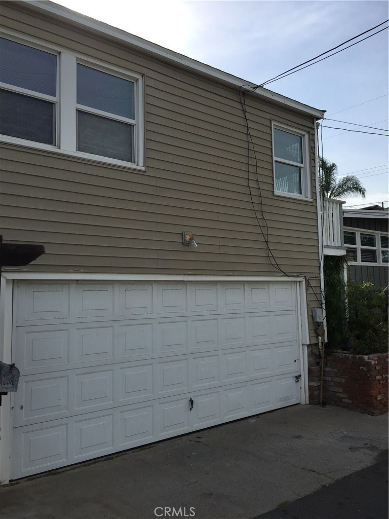 Street view, upper unit w/garage below - 31642 Virginia Way, Laguna Beach CA 92651 - photo 1