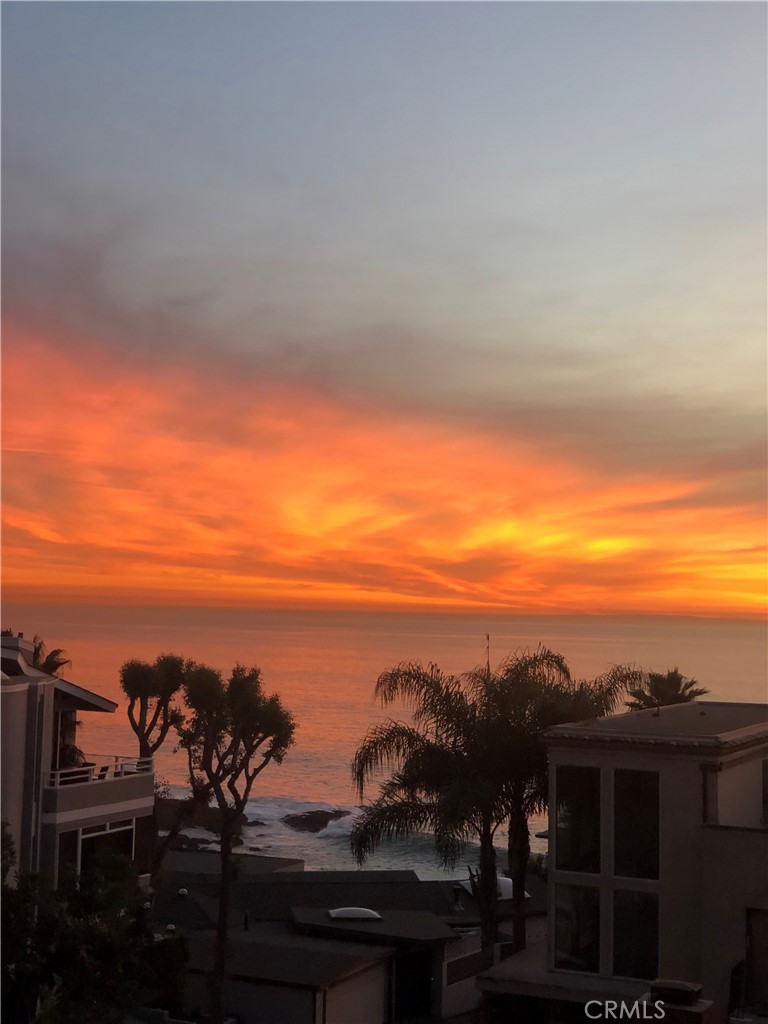 Enjoy spectacular sunsets from this well designed home. - 31717 Seacliff Drive, Laguna Beach CA 92651 - photo 1