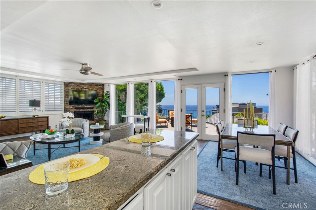 Receded view towards French doors large windows with expansive ocean views. - 31731 Seacove, Laguna Beach CA 92651 - photo 25