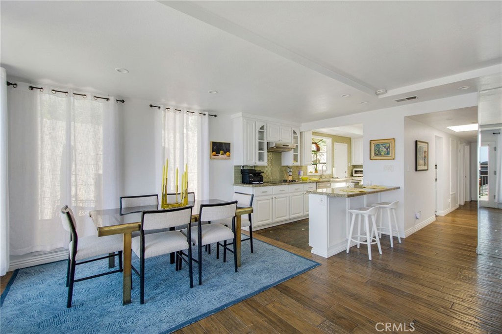 Vew of dining area and open kitchen. - 31731 Seacove, Laguna Beach CA 92651 - photo 30