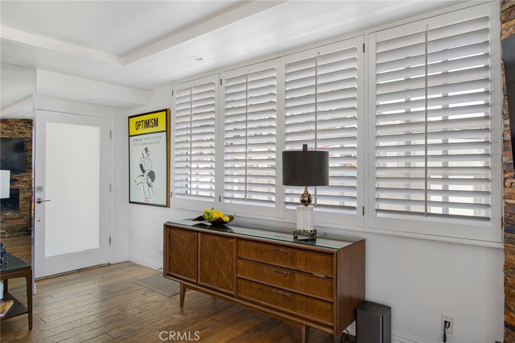Front door entry with frosted glass, recessed lighting and plantation shutters. - 31731 Seacove, Laguna Beach CA 92651 - photo 31