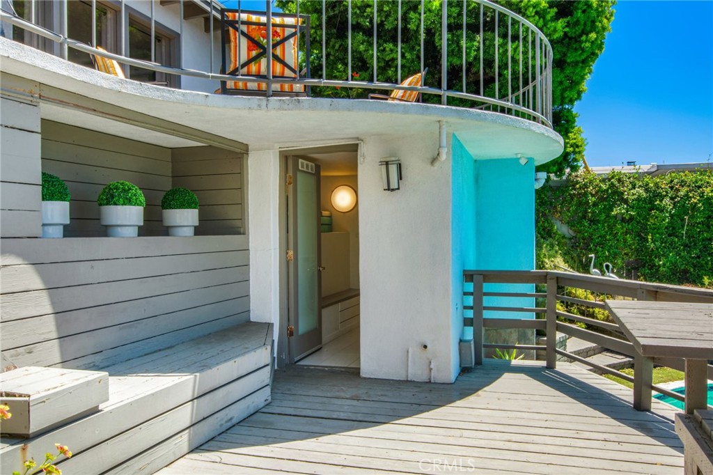 Convenient exterior access from the deck leads directly to the laundry/utility room with adjacent half bath. - 31731 Seacove, Laguna Beach CA 92651 - photo 52