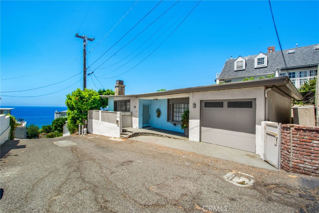 Receded view of home and private road leading down to private beach. - 31731 Seacove, Laguna Beach CA 92651 - photo 55
