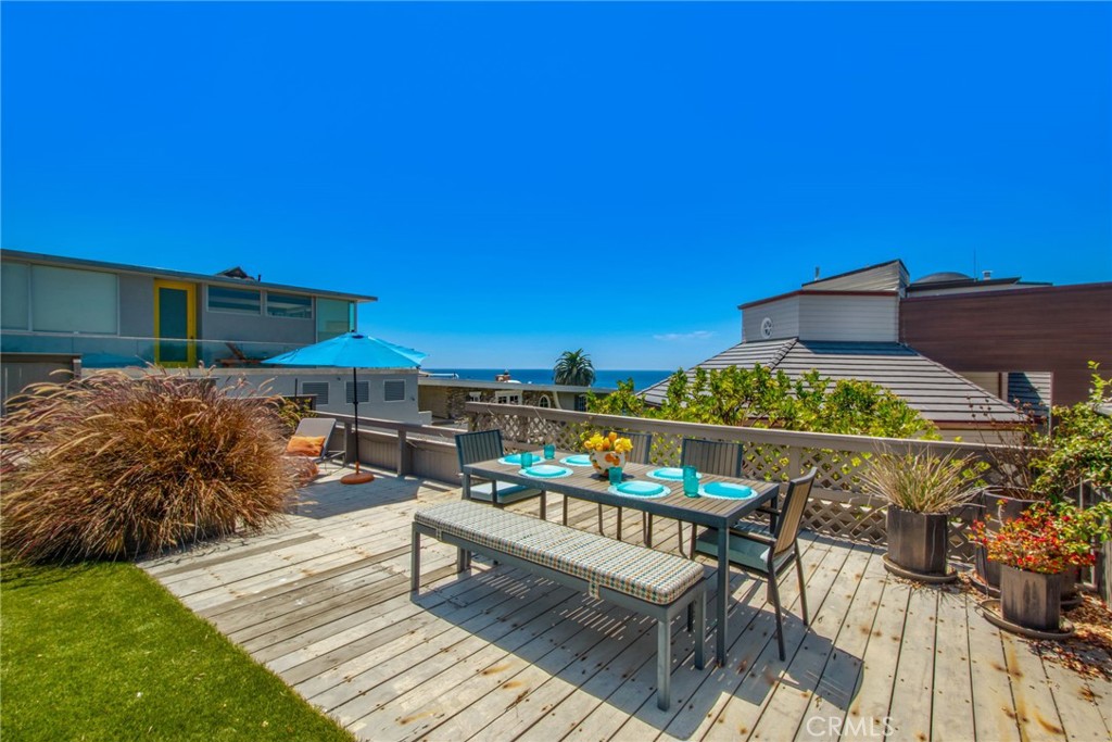 Ocean-view deck offering an outdoor dining and entertaining area with panoramic coastal views. - 31731 Seacove, Laguna Beach CA 92651 - photo 59