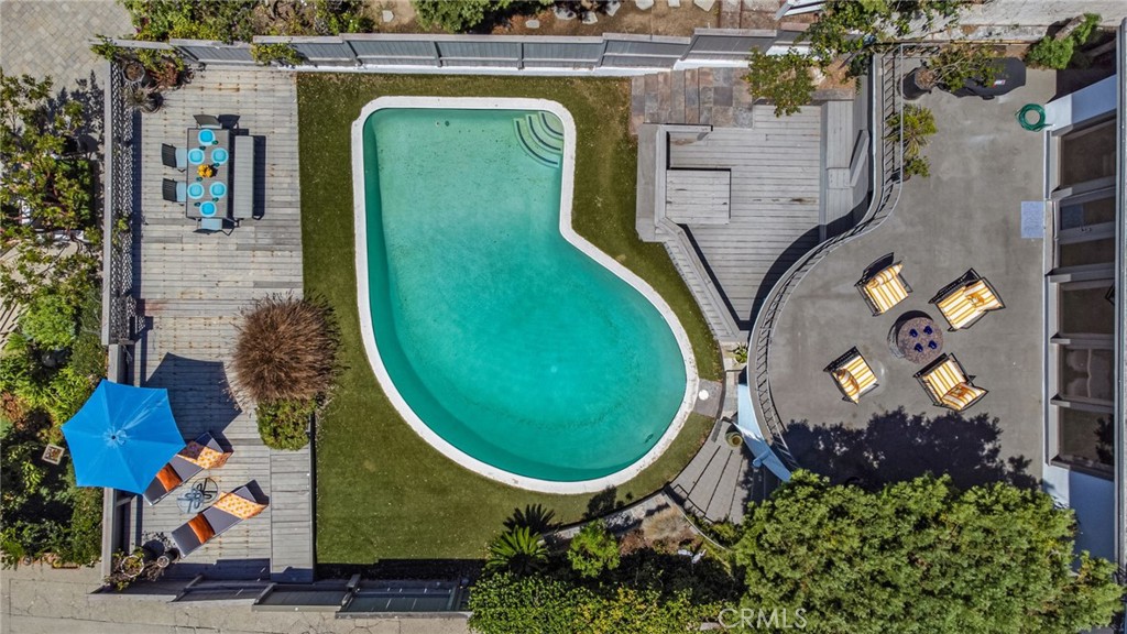 Over head of private swimming pool, expansive multi-level outdoor living areas, spacious decks for dining and lounging, - 31731 Seacove, Laguna Beach CA 92651 - photo 64