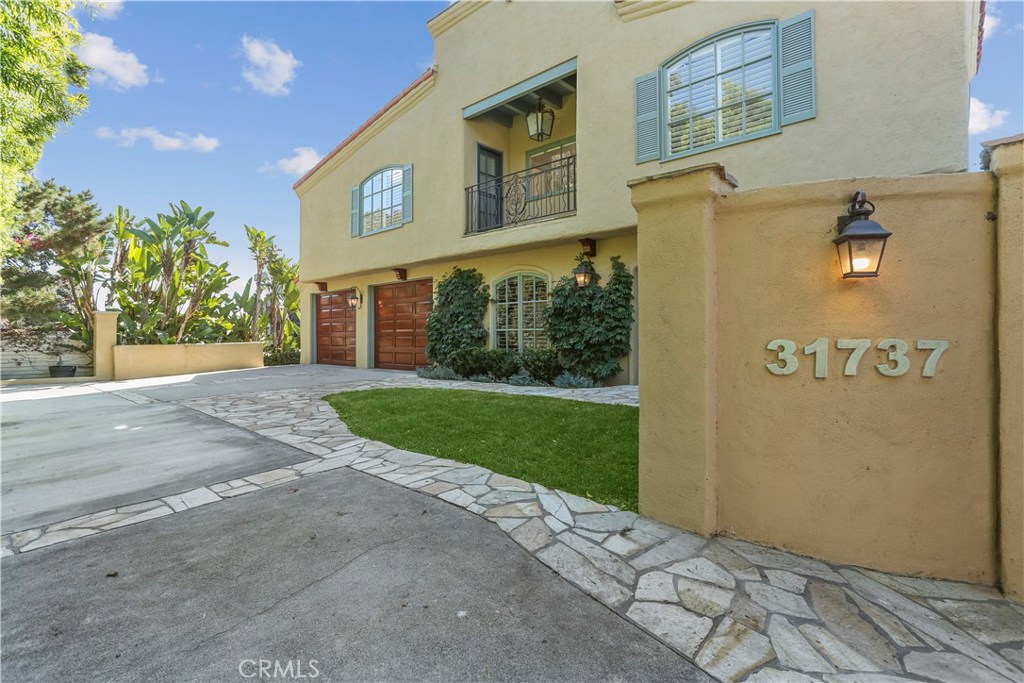 The motorized private gate opens to this gorgeous ocean view home. - 31737 Seacliff Drive, Laguna Beach CA 92651 - photo 1