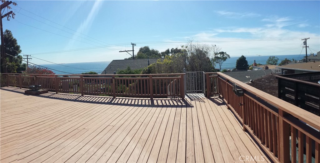 AMAZING DECK WITH OCEAN AND CATALINA VIEWS! PERFECT FOR ENTERTAINING OR RELAXING AFTER A DAY AT THE BEACH! - 31741 4TH Avenue, Laguna Beach CA 92651 - photo 1