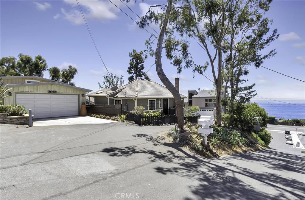 Home is one on left, short walk down street to the beach, restaurants, shops or catch a trolley on the weekends to downt - 31786 5th Avenue, Laguna Beach CA 92651 - photo 1
