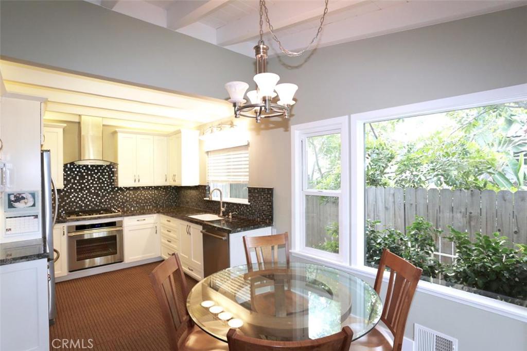 Gorgeous remodeled kitchen complete with new stainless steel appliances including fridge, gas range, dishwasher, oven, m - 31867 8th Avenue, Laguna Beach CA 92651 - photo 1