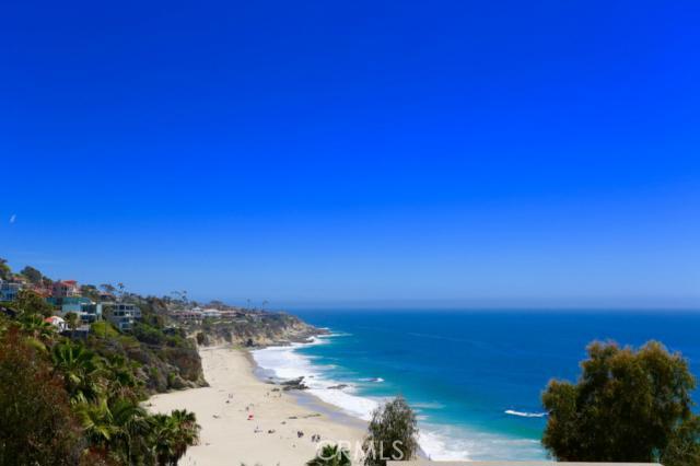 PRIVATE BEACH ACCESS TO LAGUNA'S MOST BEAUTIFUL COVE "THOUSAND STEPS" BEACH. VIEW FROM DECK OFF LIVING ROOM. - 31902 Circle Drive, Laguna Beach CA 92651 - photo 1