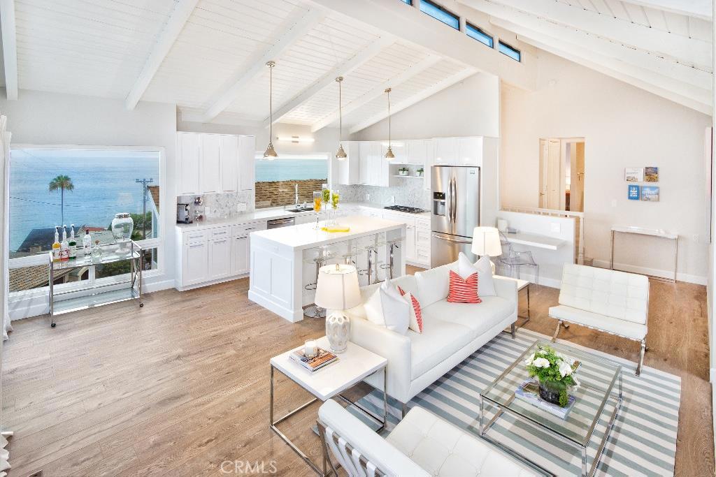 Stunning white water ocean view from beautifully remodeled kitchen and living room. - 31902 Circle Drive, Laguna Beach CA 92651 - photo 1