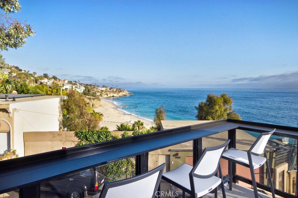PRIVATE BEACH ACCESS TO LAGUNA'S MOST BEAUTIFUL COVE "THOUSAND STEPS" BEACH. VIEW FROM DECK OFF LIVING ROOM. - 31902 Circle Drive, Laguna Beach CA 92651 - photo 1