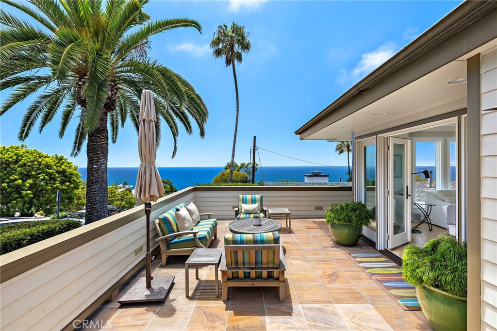 One of several exterior, ocean view, entertaining areas. - 31953 10th Avenue, Laguna Beach CA 92651 - photo 3