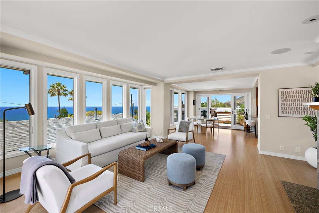Wonderful open floor plan with living room looking towards the dining room. - 31953 10th Avenue, Laguna Beach CA 92651 - photo 7