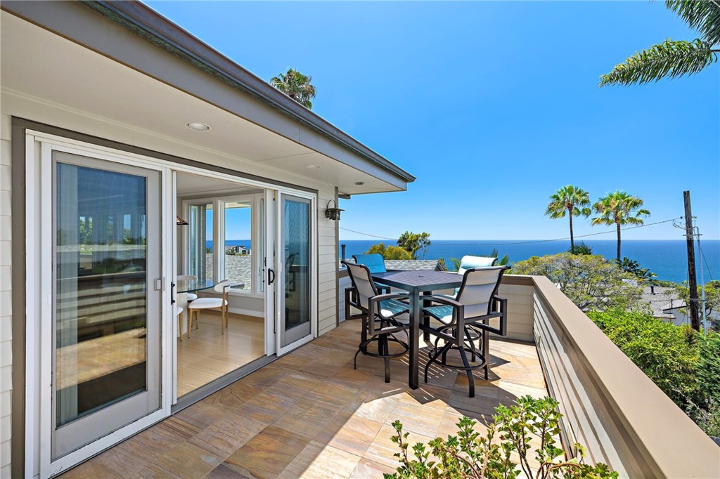 Ocean view deck located off the kitchen and dining area. - 31953 10th Avenue, Laguna Beach CA 92651 - photo 20