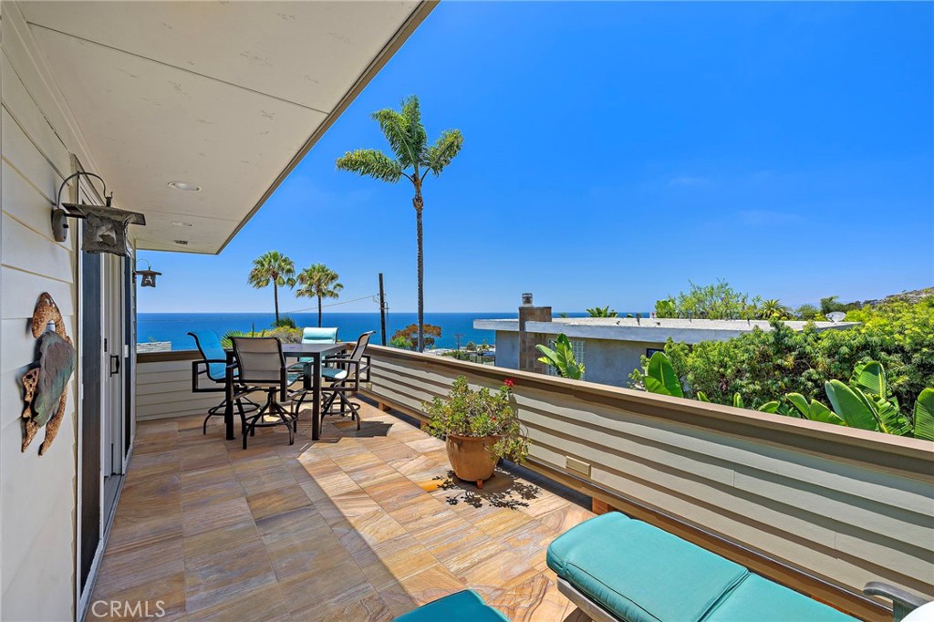 Ocean view deck located off the kitchen and dining area. - 31953 10th Avenue, Laguna Beach CA 92651 - photo 23