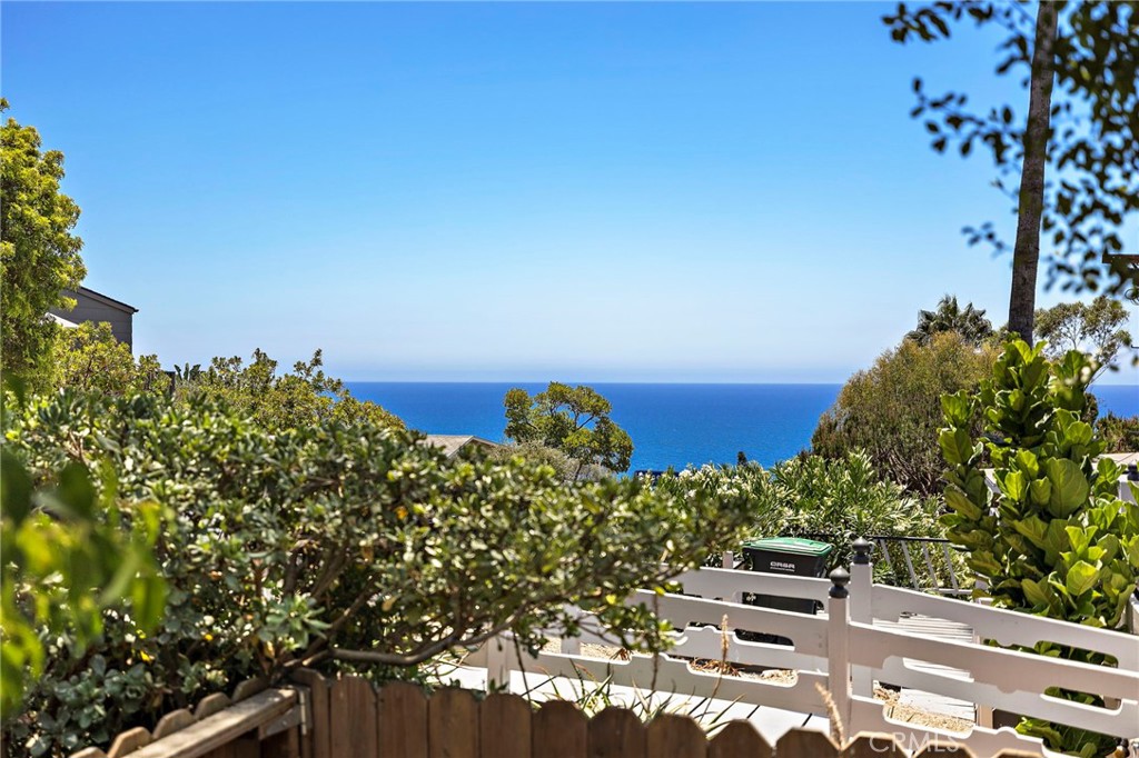 Patio located off the primary bedroom with ocean views. - 31953 10th Avenue, Laguna Beach CA 92651 - photo 30