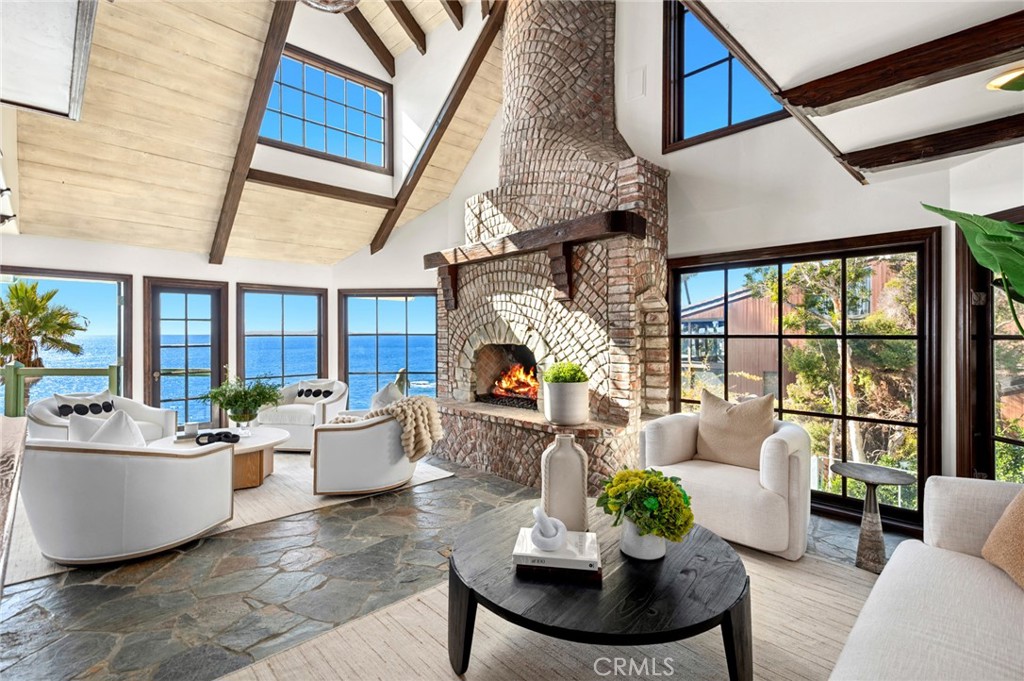 Designed to celebrate its dramatic oceanfront setting, the property blends timeless craftsmanship with whimsical archite - 31971 Coast Highway, Laguna Beach CA 92651 - photo 3