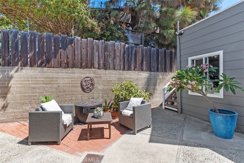 Back courtyard with firepit - 31982 Virginia Way, Laguna Beach CA 92651 - photo 32