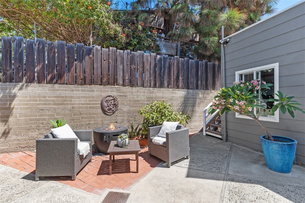 Back courtyard with firepit - 31982 Virginia Way, Laguna Beach CA 92651 - photo 33