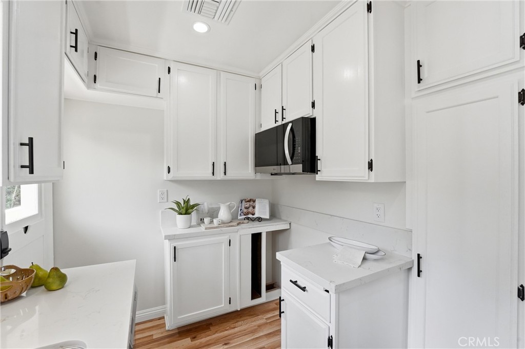 Kitchen with lots of extra cabinets and storage - 32021 & 32001 sunset Avenue, Laguna Beach CA 92651 - photo 13