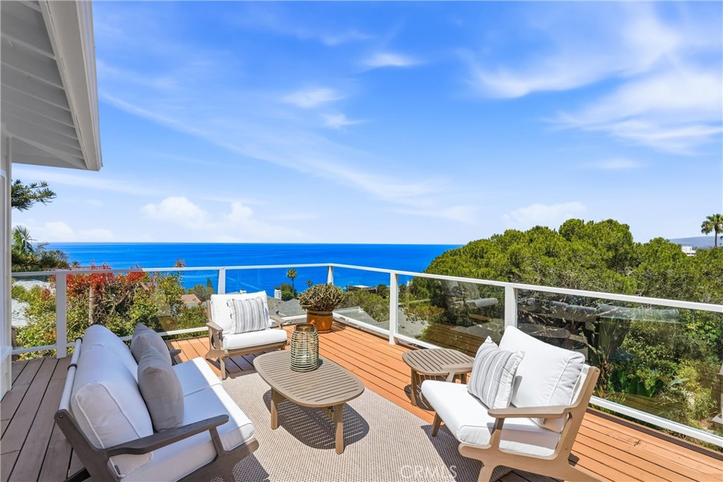 More balcony at main level with forever views - 32021 & 32001 sunset Avenue, Laguna Beach CA 92651 - photo 16