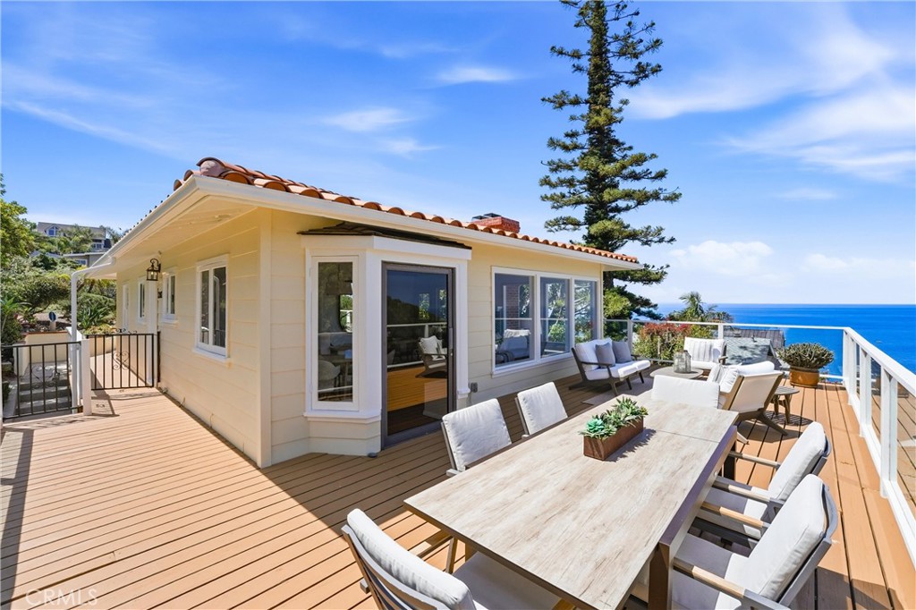 Main level areas with gated entry to balcony - 32021 & 32001 sunset Avenue, Laguna Beach CA 92651 - photo 18