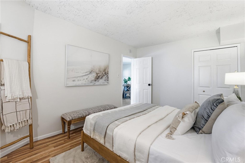 3rd bedroom/den at lower level with new floorings, closet, newly upgraded, updated - 32021 & 32001 sunset Avenue, Laguna Beach CA 92651 - photo 25
