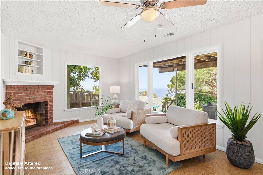 Living room at lower level - 32021 & 32001 sunset Avenue, Laguna Beach CA 92651 - photo 29