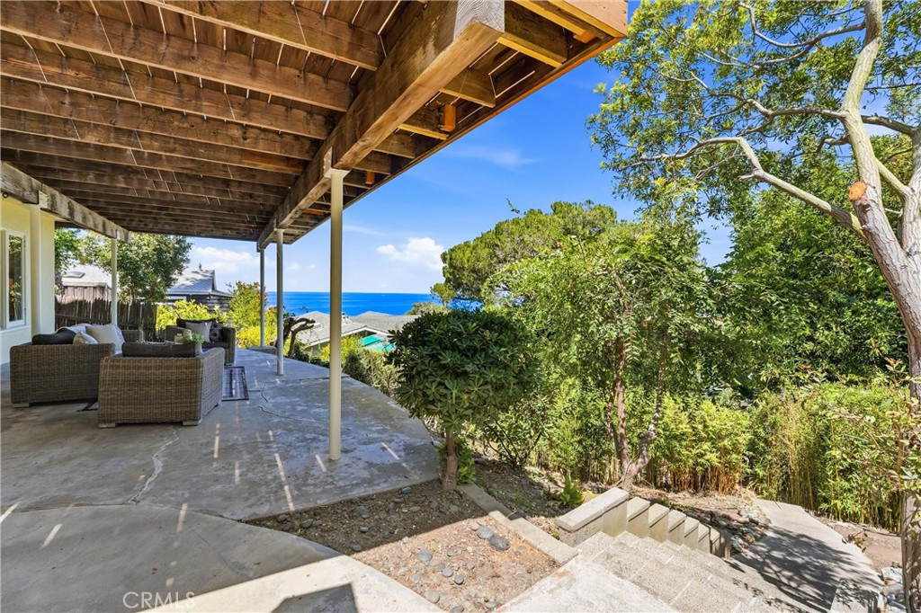 Lower level deck with ocean views - 32021 & 32001 sunset Avenue, Laguna Beach CA 92651 - photo 34